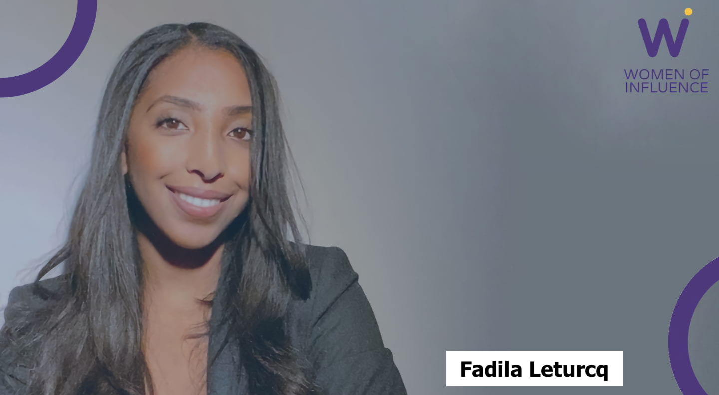 Portrait of Fadila Leturcq with WoI logo in the upper right corner.